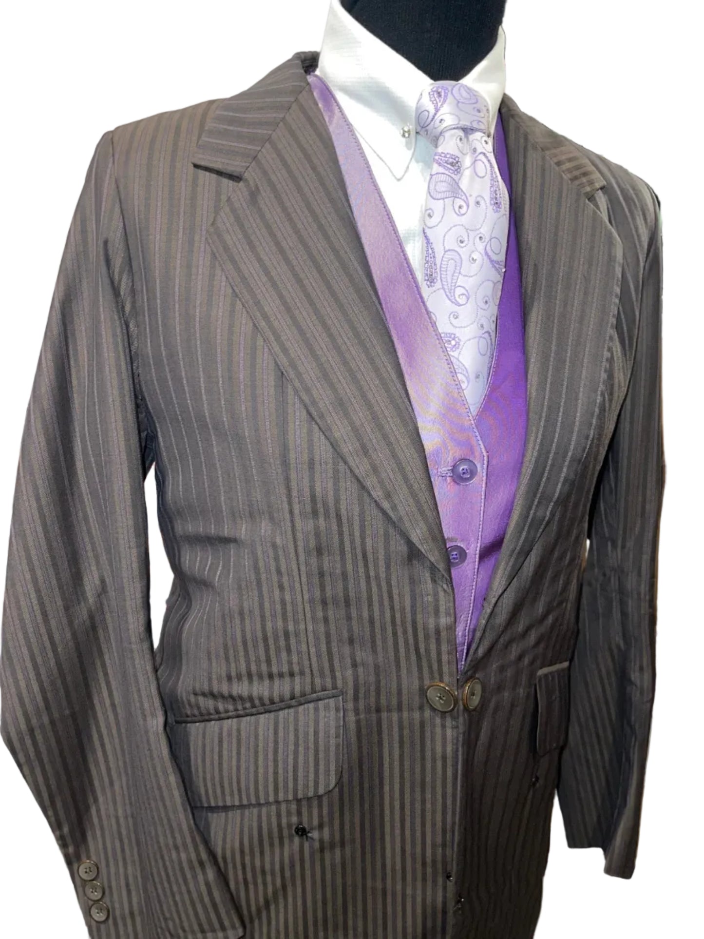 Marsha De Arriaga, Brown and Purple Suit