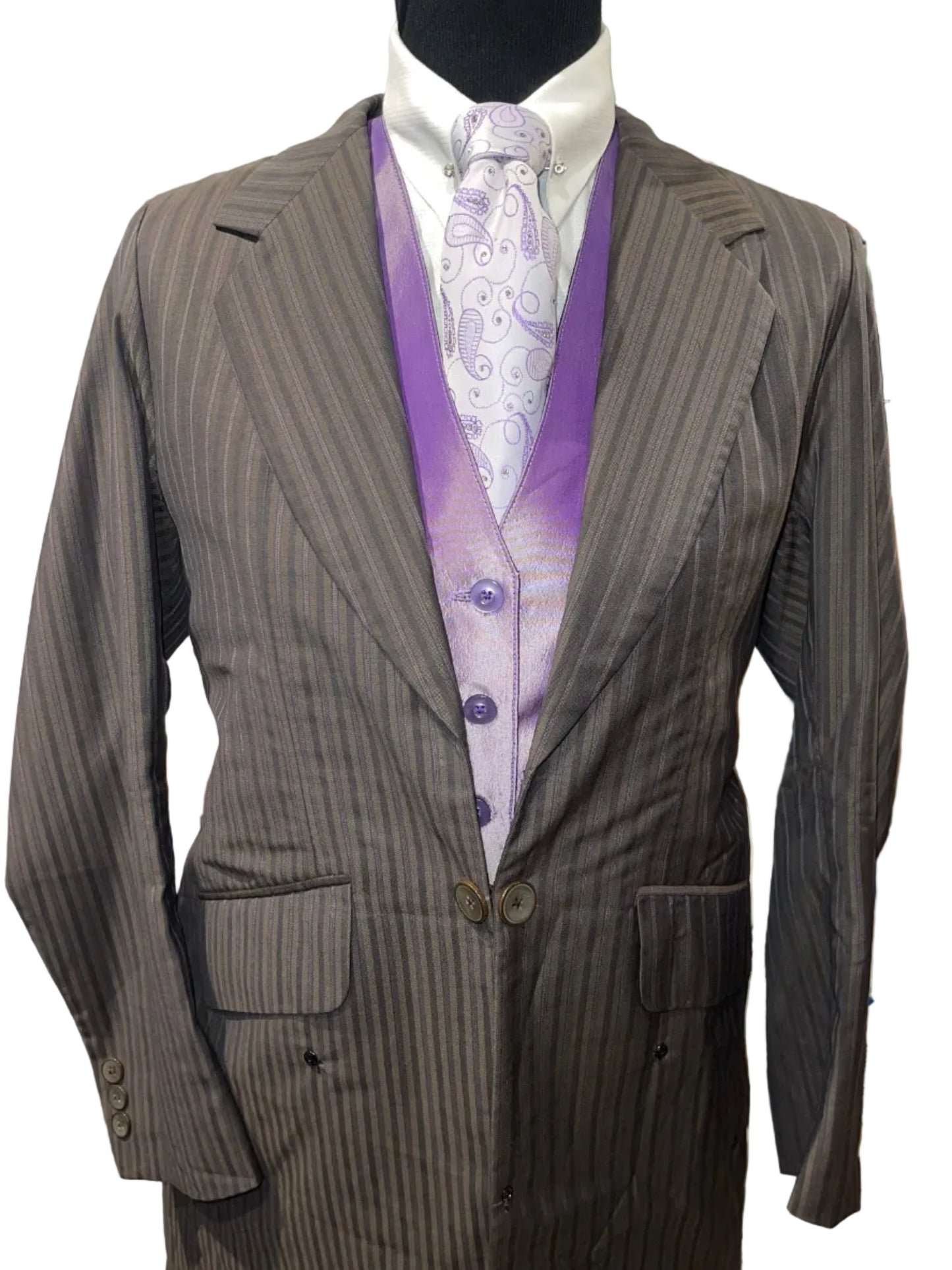 Marsha De Arriaga, Brown and Purple Suit