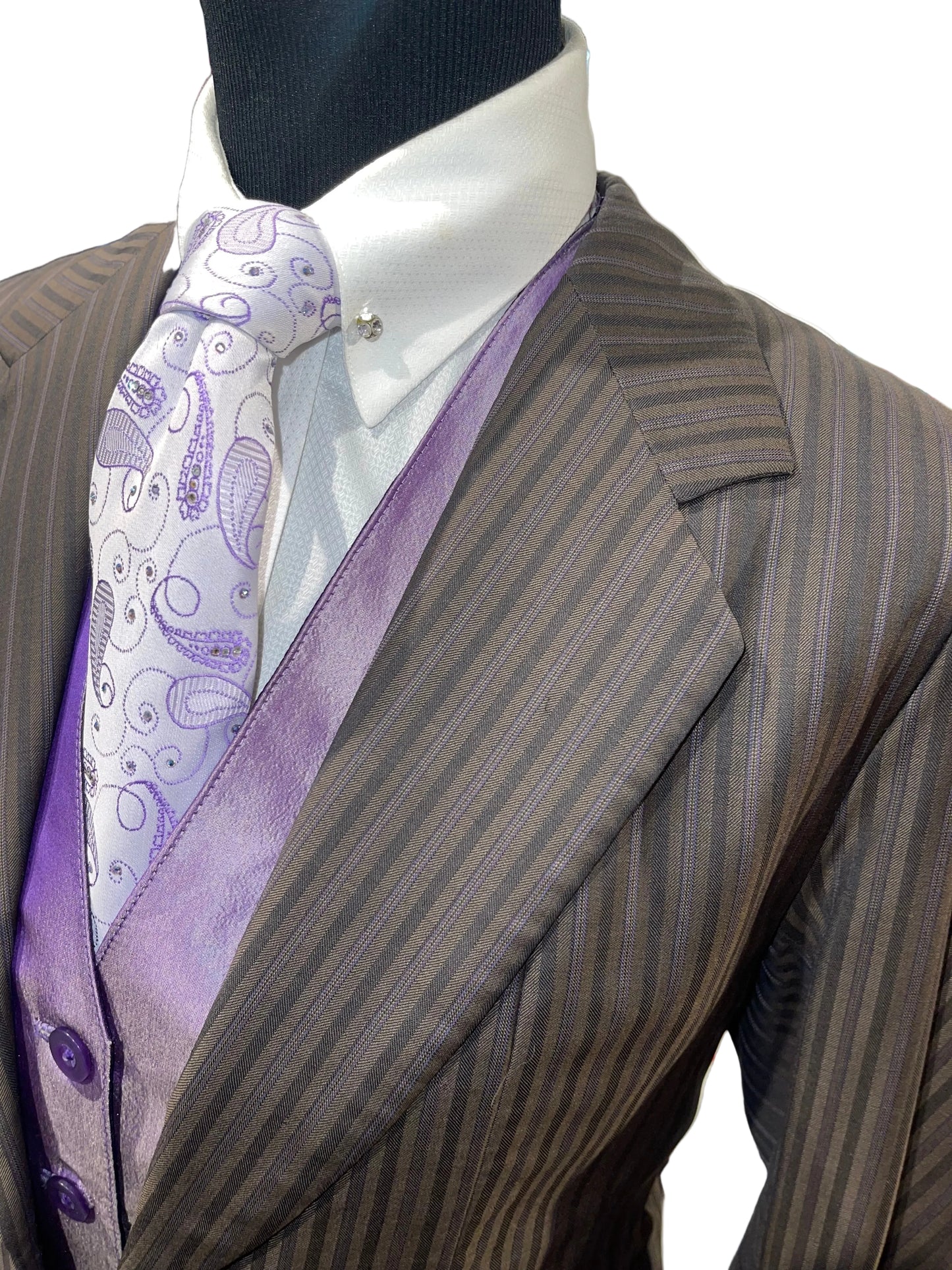 Marsha De Arriaga, Brown and Purple Suit