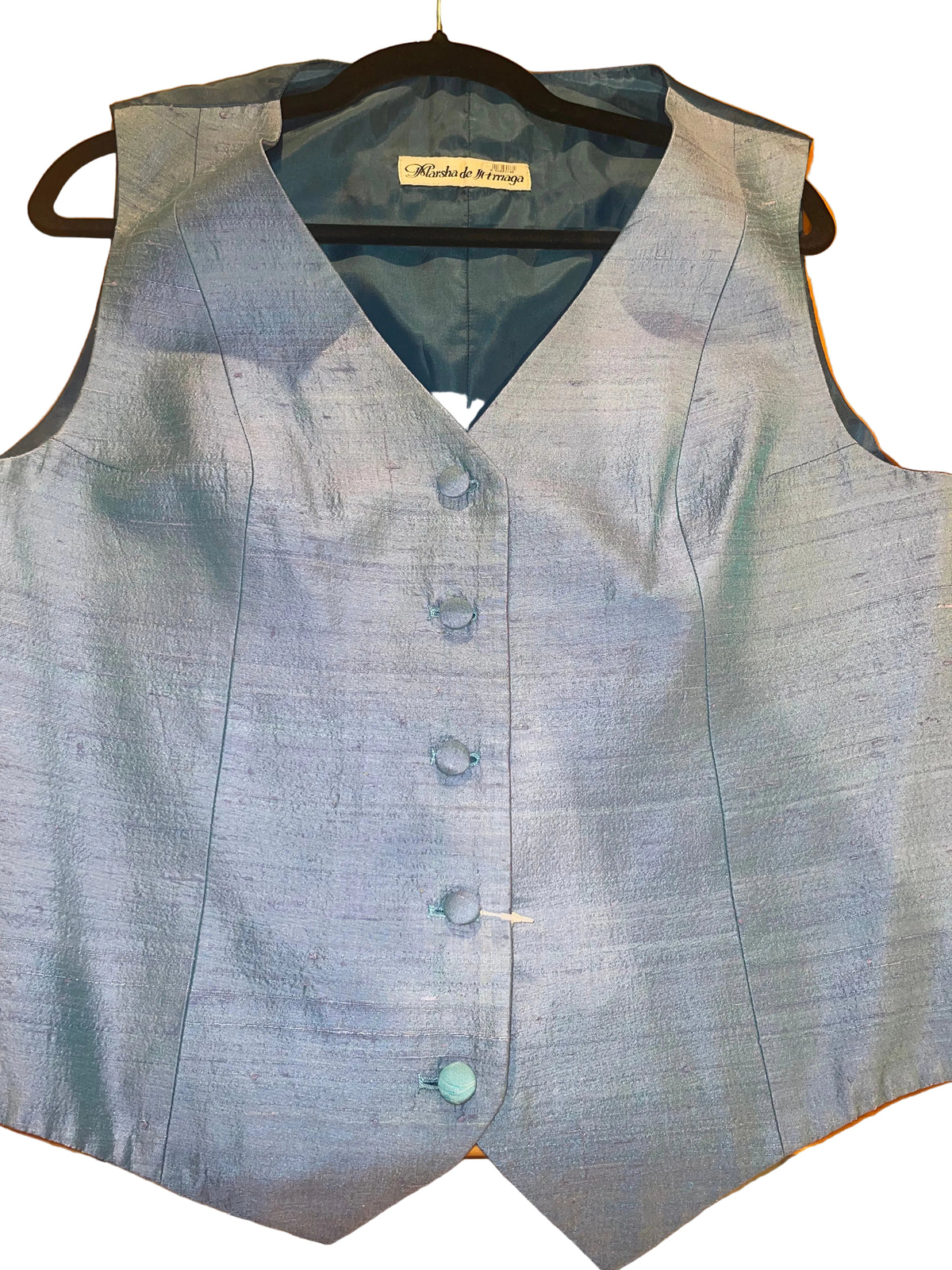 Marsha De Arriaga, Blue Vest