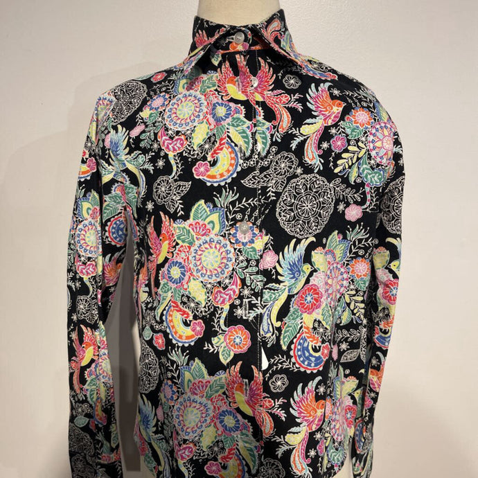 Black shirt w/ a bright floral pattern