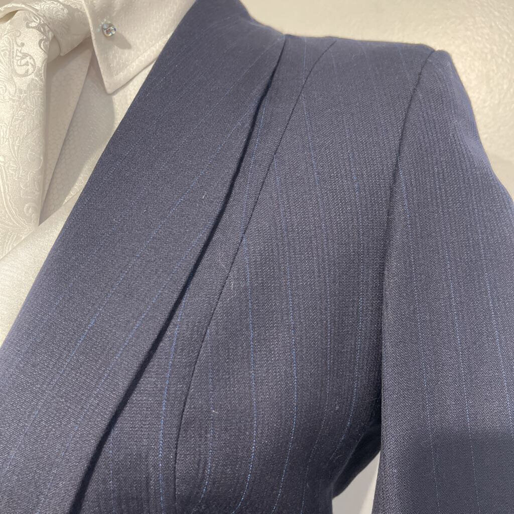 Suit with a light blue pin stripe