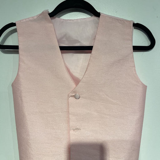 Pink Vest - slight rip in bottom