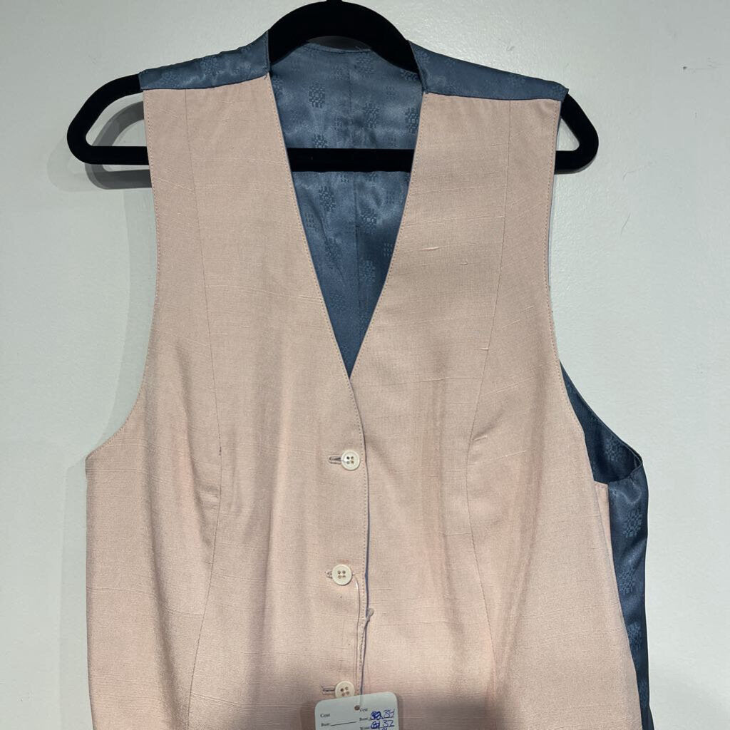 blue and pink reversible vest